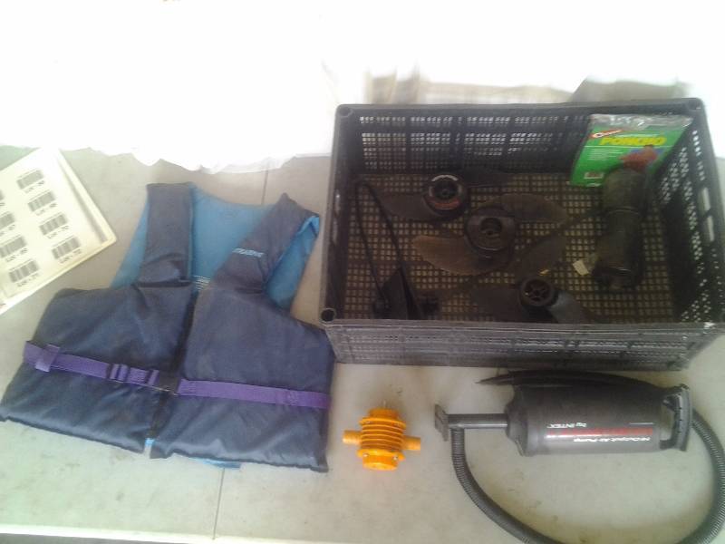 lot 63 image: Boating Rabbit Ears, Trolling Motor Props, Life Vest, Air Pump, Poncho, Drill Pump