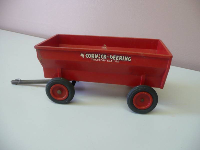 lot 18 image: 1950s McCormick-Deering Tractor-Trailer -   Made By  Product Miniature Co. Milwaukee, Wis. USA - See Pictures