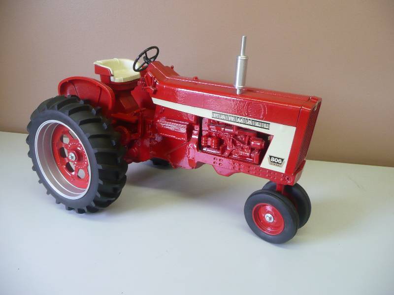 lot 20 image: Large Ertl Farmall Diesel Red Tractor - Approx 18 inches long - Like New Condition -  Stamped Farmall 806 Collector Edition 1997 - Very heavy Piece - See Pictures