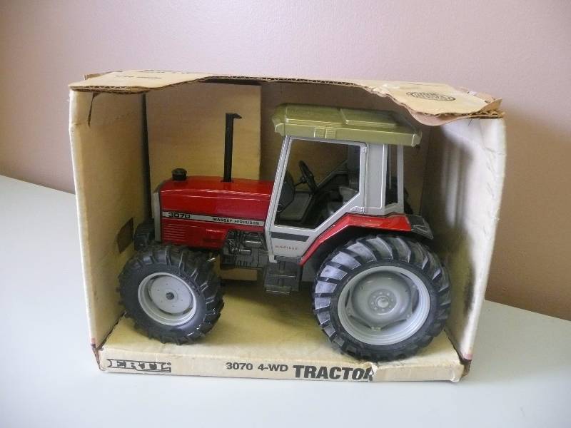 lot 42 image: Ertl Inc. Massey Ferguson 3070 4-WD Tractor - 116 Scale - Still In Box - See Pictures