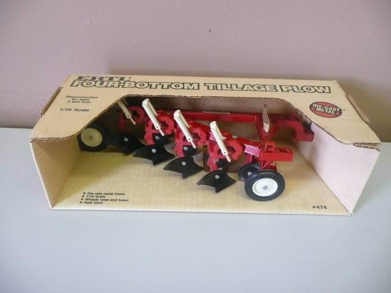 lot 48 image: Vintage Ertl Inc. Four Bottom Tillage Plow, 116 Scale, Die Cast Metal Frame, Wheels Raise & Lower, Real Hitch - New In Box - See Pictures