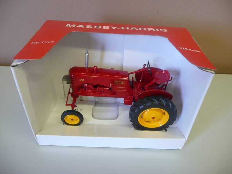 lot 59 image: SpecCast Massey-Harris 116 Scale 22 Tractor - New In Box, Heavy - See Pictures