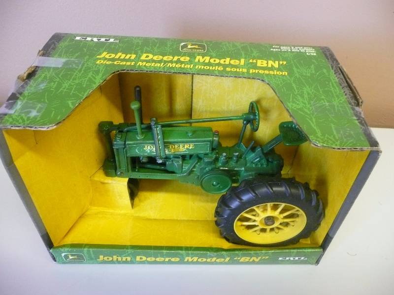 lot 74 image: Ertl Inc. 116 Scale John Deer Model BN Tractor - Still In Box - See Pictures