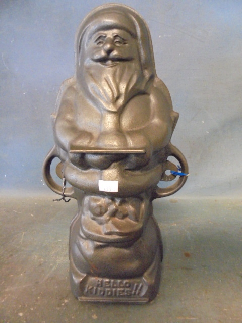 lot 14 image: Griswold  Cast Iron Santa Claus Candy and Cake Mold