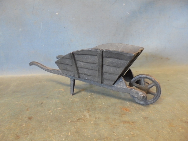 lot 41 image: Decorative Cast Iron Wheel Barrel