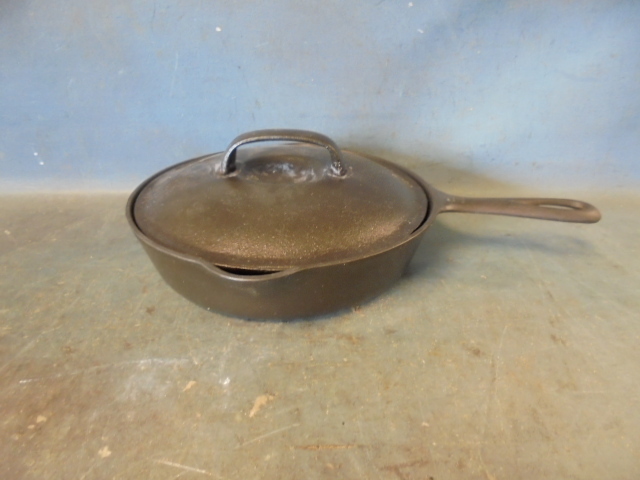 lot 56 image: Griswold Cast Iron Skillet with Lid