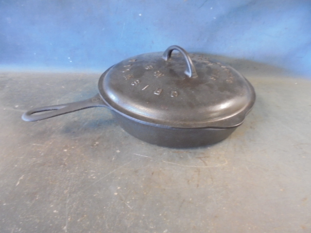 lot 64 image: Griswold Cast Iron Skillet with Lid