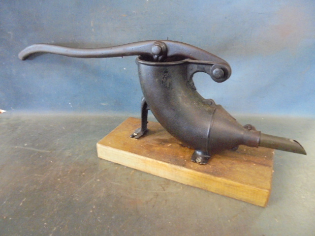 lot 85 image: Antique Cast Iron Sausage Stuffer