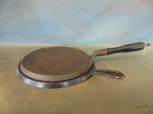 lot 93 image: Griswold Cast Iron Griddles