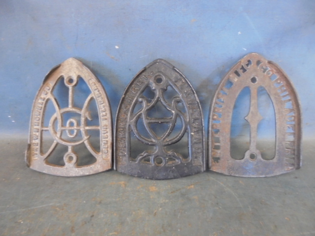 lot 106 image: Antique Clothes Iron Trivets