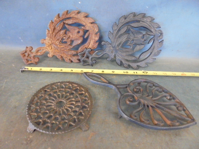 lot 108 image: Cast Iron Trivets