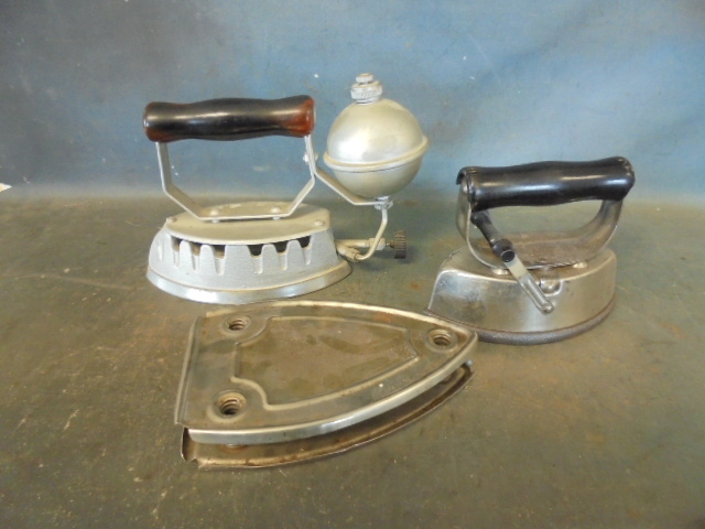 lot 113 image: Antique Clothes Irons and Trivet