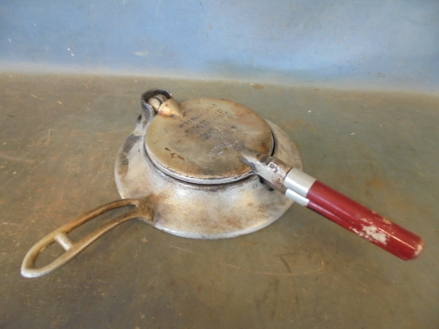 lot 120 image: Kumkake Iron