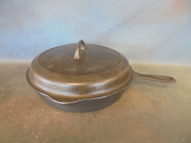 lot 130 image: Griswold Cast Iron Skillet with Lid