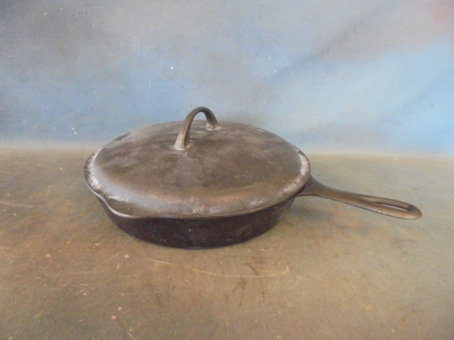 lot 147 image: Cast Iron Skillet with Lid