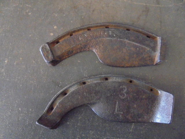 lot 153 image: Cast Iron Horseshoe Halves