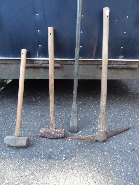 lot 16 image: Pick axe. 2 sledge hammers. Pry bar...