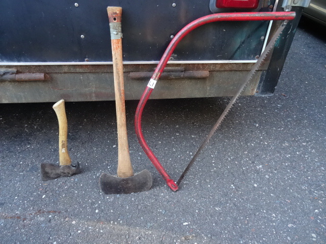 lot 17 image: 2 hand axes. Bow saw...