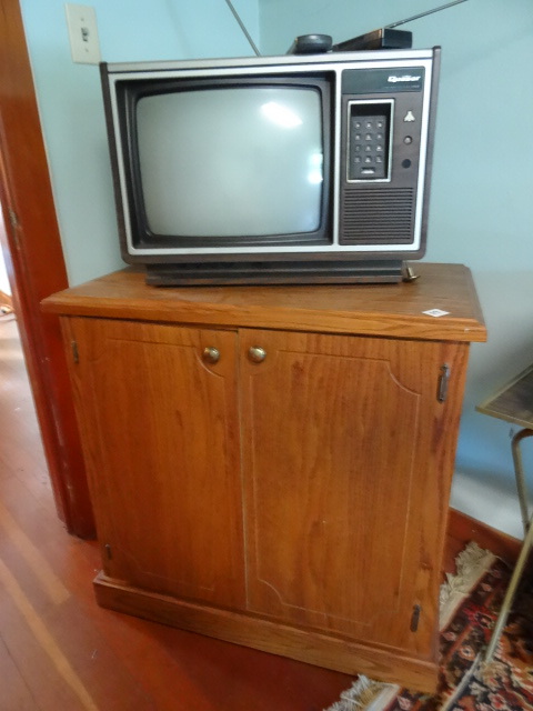 lot 52 image: Quasar 15 color TV with remote.  W...