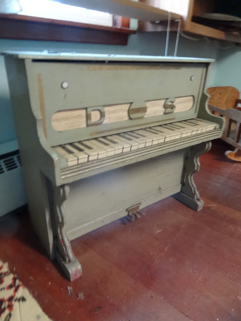 lot 54 image: Vintage kids piano with stool. Keys...