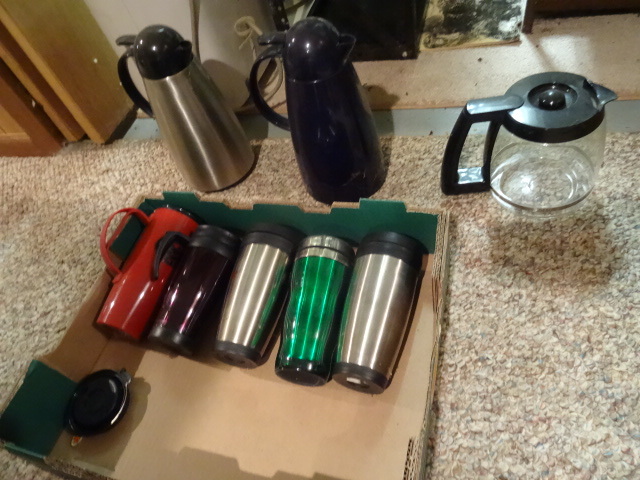 lot 99 image: Coffe mugs and insulated coffe pots...