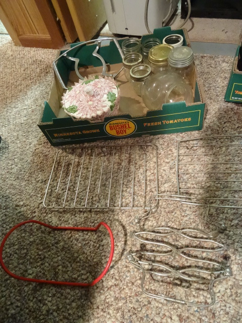 lot 101 image: Misc canning jars. Cooling racks. C...