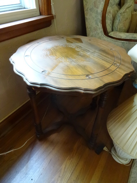 lot 203 image: Sculpted round end table. 26 x 24...