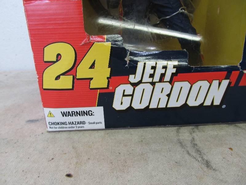 lot 82 image: NIB 12 McFarlane Jeff Gordon Figure