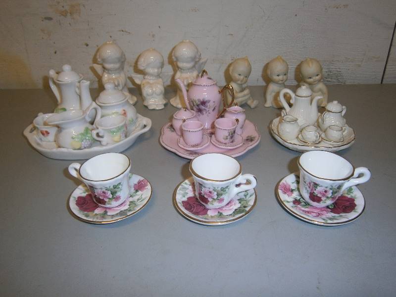 lot 152 image: Small Porcelain Tea Sets and Kewpie Dolls 