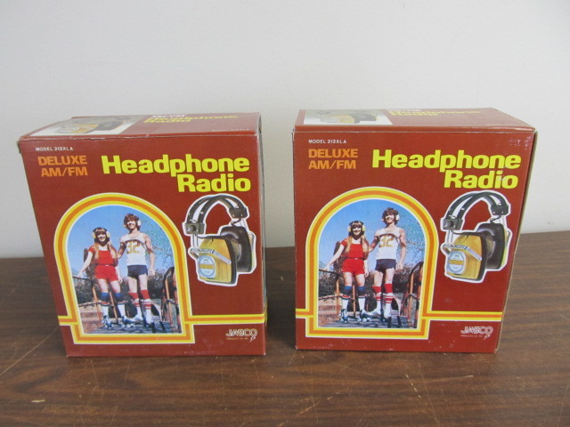 lot 218 image: 2 NEW Sets of Vintage AMFM Headphone Radios