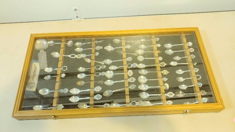 47 Collectible Spoons in Glass Display