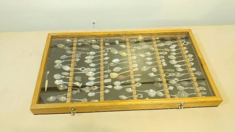 76 Collectible Spoons in Glass Display
