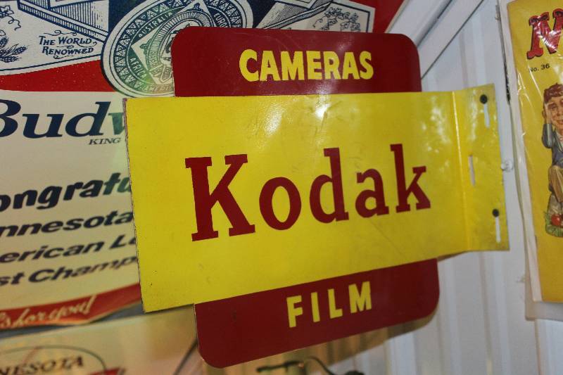 lot 230 image: Kodak Cameras & Film Sign