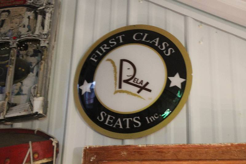 lot 251 image: Relax First Class Seats Inc. Sign