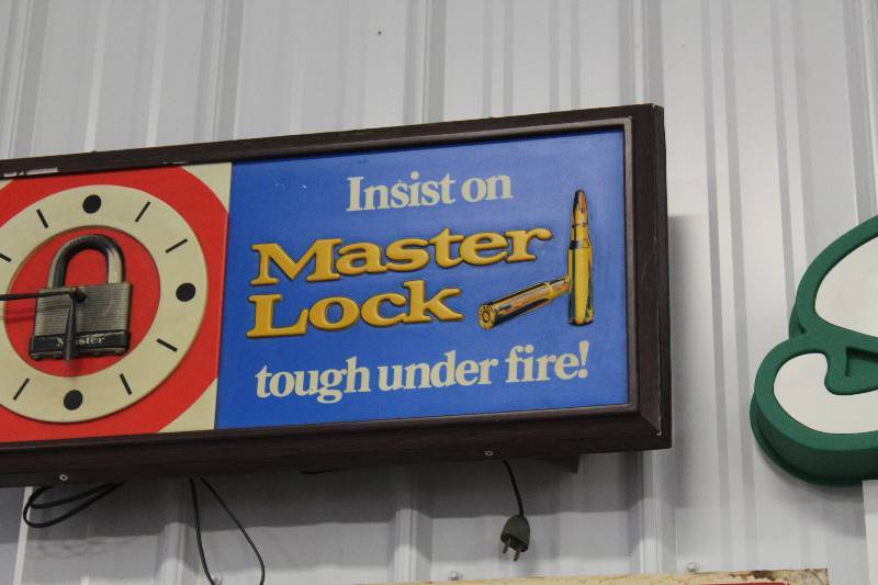 lot 43 image: Master Lock Plastic Wall Clock