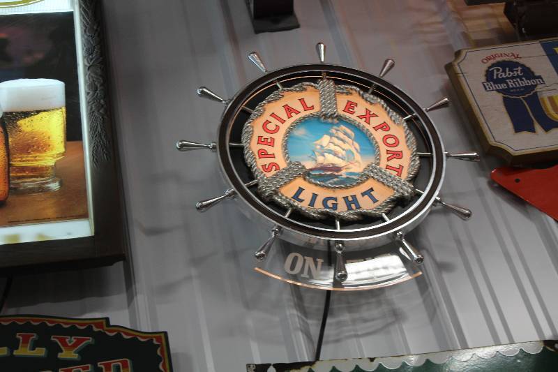 lot 62 image: Special Export Light On Tap Plastic Lighted Sign