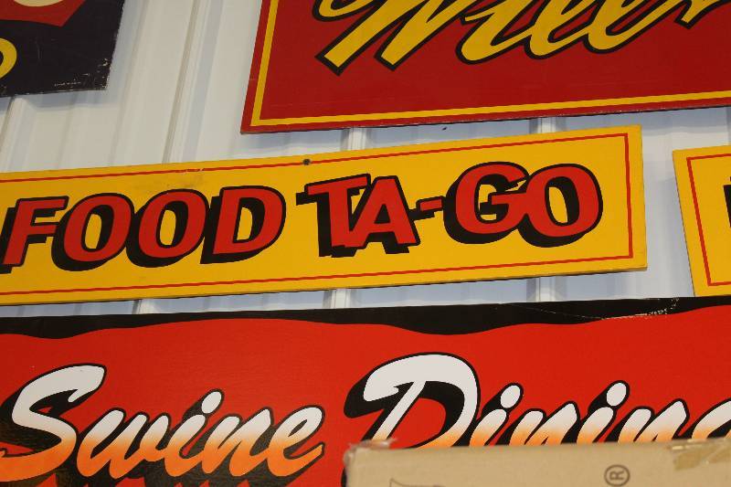lot 70 image: Food Ta-Go Wood Sign