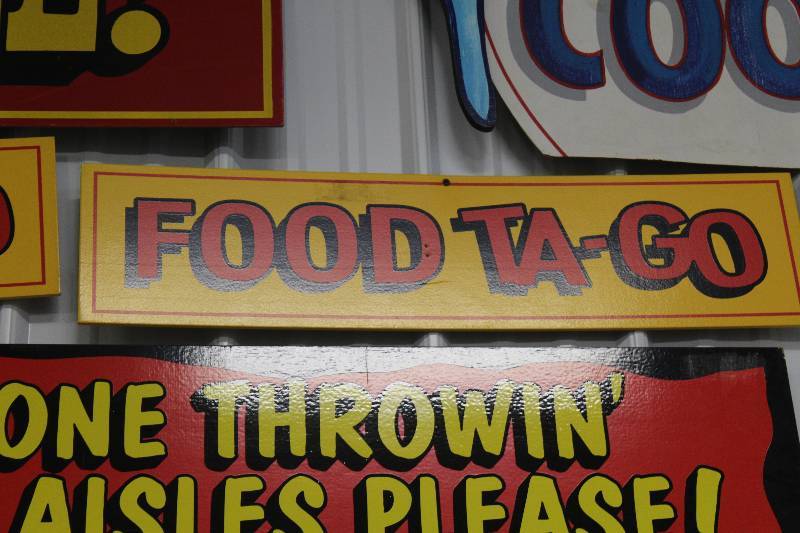 lot 72 image: Food Ta-Go Wood Sign