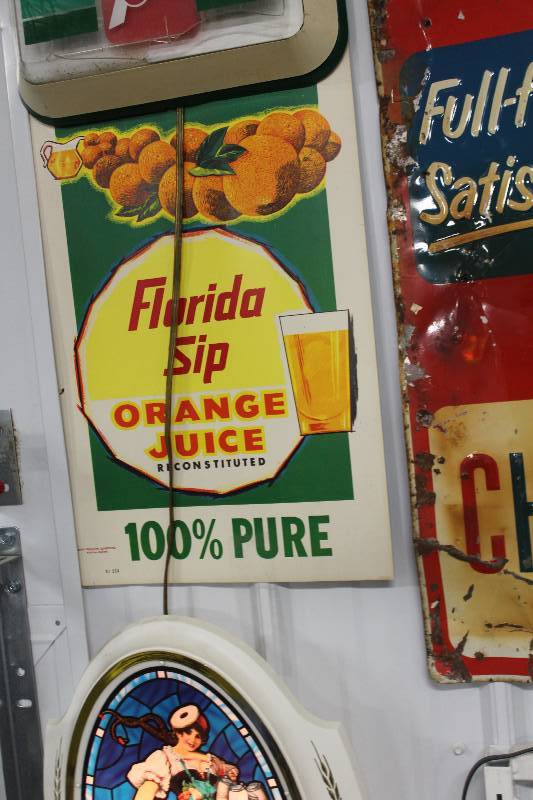 lot 83 image: Florida Sip 100% Orange Juice Sign