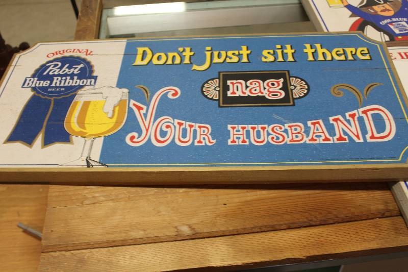 lot 97 image: Original Pabst Blue Ribbon Beer Dont Just Sit There Nag Your Husband Wood Sign