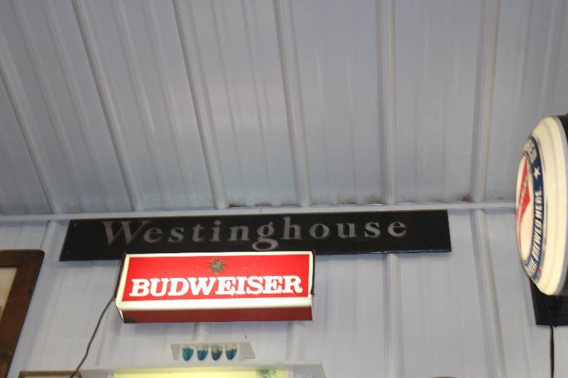 lot 125 image: Westinghouse Metal Sign