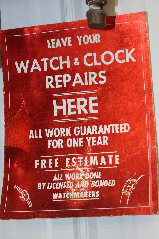 lot 141 image: Watch & Clock Repairs Sign