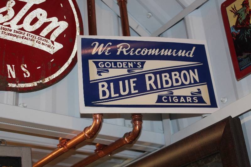 lot 193 image: We Recommend Goldens Blue Ribbon Cigars Sign