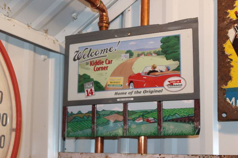 lot 207 image: Welcome To Kiddie Car Corner Sign