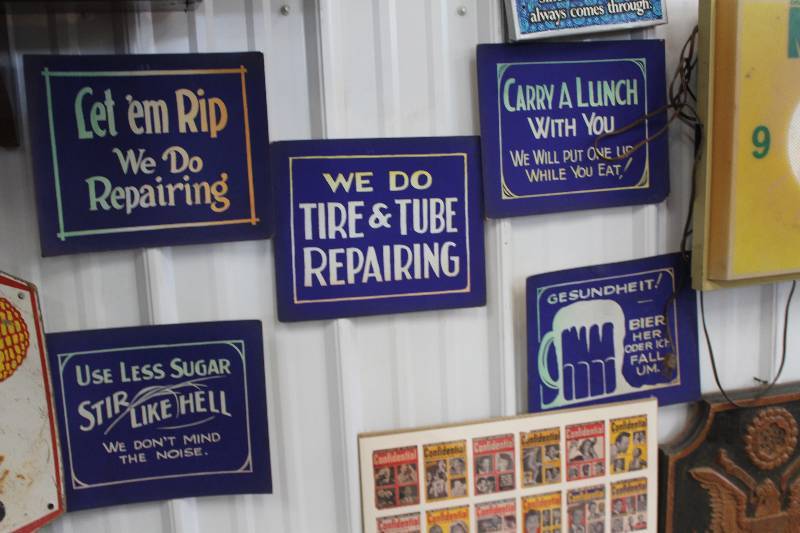 lot 287 image: Lot of (5) Cardboard Signs Includes Let em Rip We do Repairing , We Do Tire & Tube Repairing, Use Less Sugar Stir Like Hell, Carry A Lunch With You