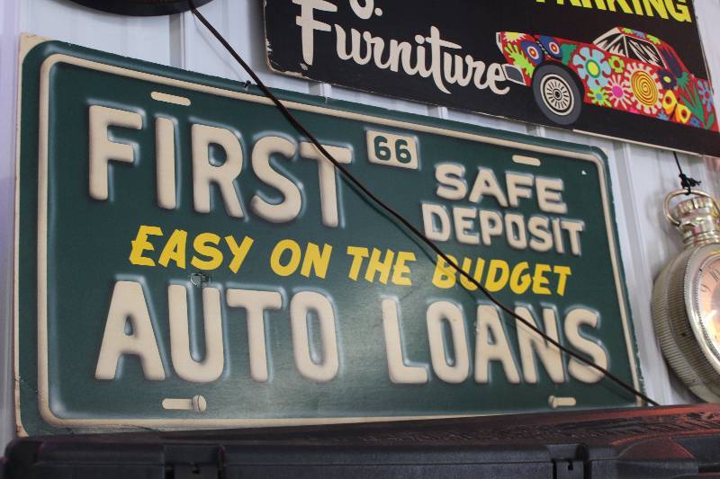 lot 314 image: First Auto Loans Cardboard Sign