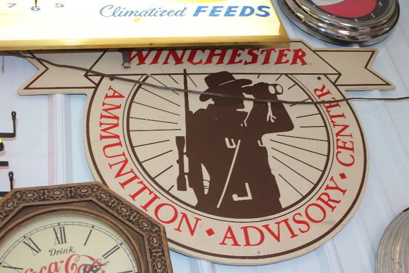 lot 320 image: Winchester Ammunition Advisory Center Particle Board Sign