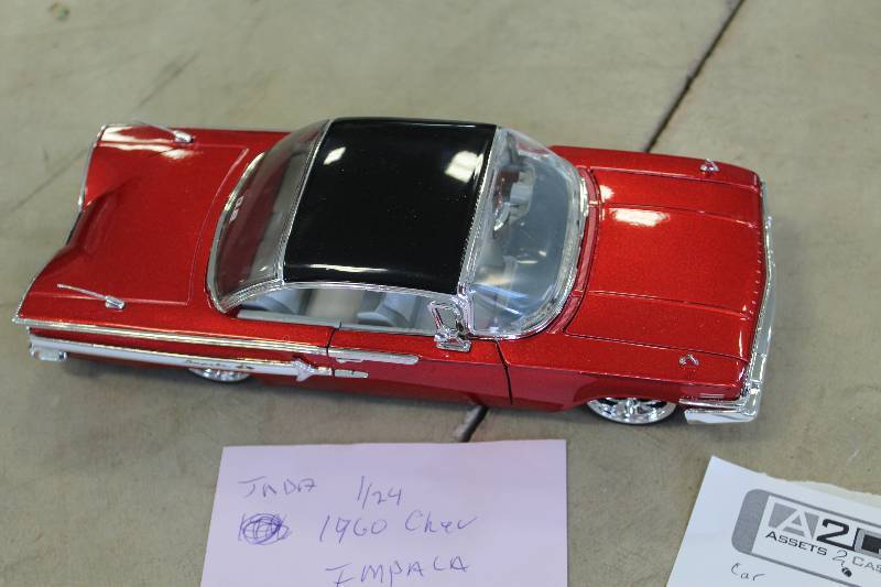lot 403 image: Jada Toys 124 1960 Chevrolet Impala