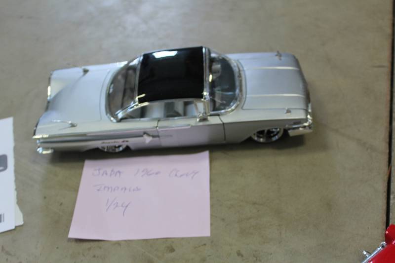 lot 401 image: Jada Toys 124 1966 Chevrolet Impala