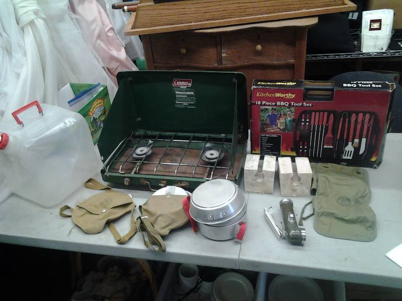 lot 24 image: New BBQ Utensil Tool Set, Camp Stove (Dented), Water Jug, Roof Top Canoe Pads, Boy Scout Flashlight & Mess Kits